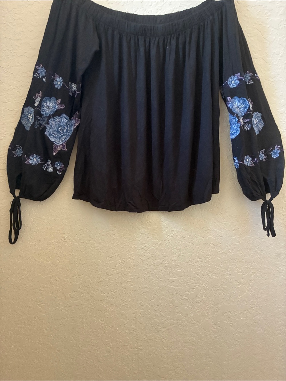American Eagle Black Off-Shoulder Peasant Top with Blue Floral Embroidery